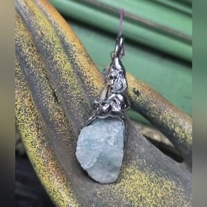 Blue Raw Aquamarine Stone In A Floral Pendant, Brutalistic